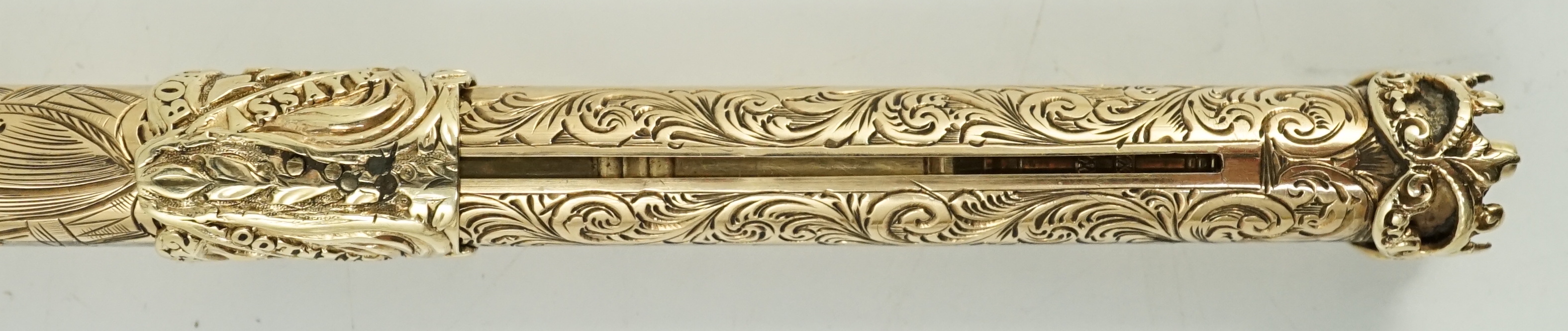 A Victorian chased 15ct gold telescopic pencil made by Sampson Mordan in 1852 in commemoration of the death of the Duke of Wellington